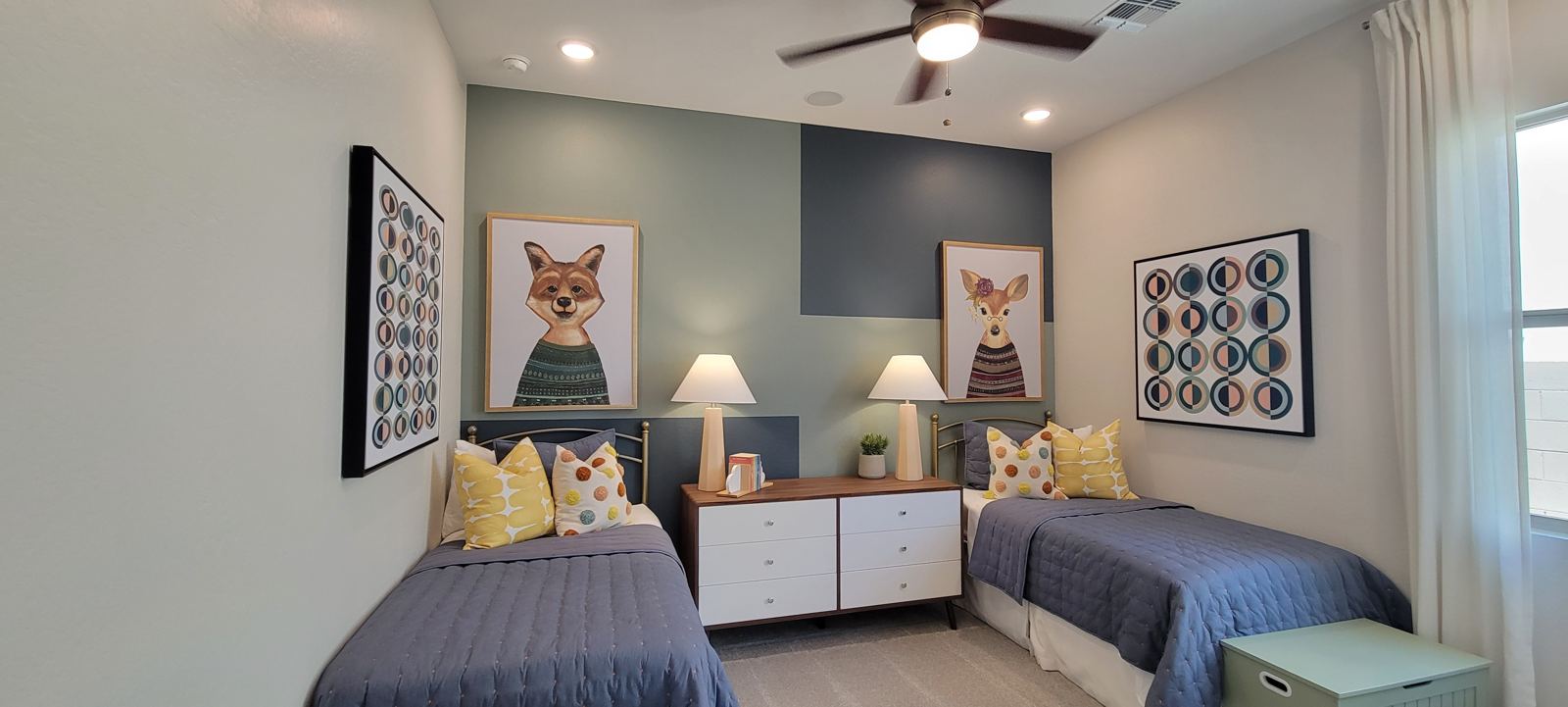 Geometric accent wall in a twin bedroom